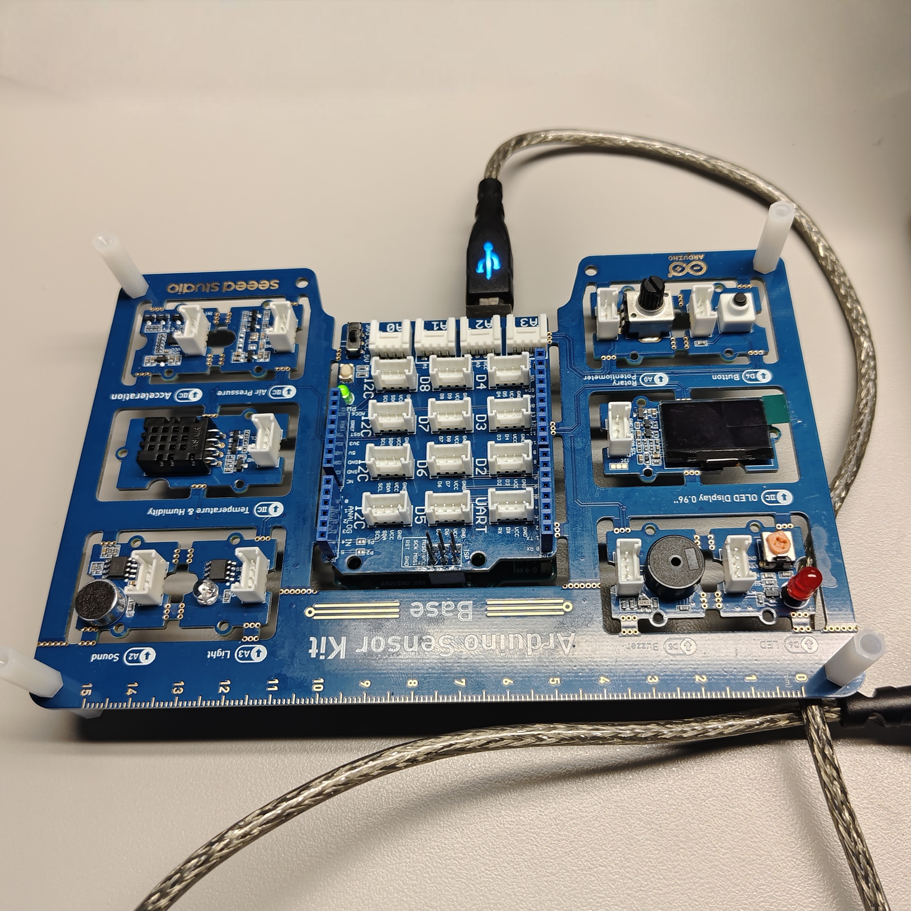 Connecting the Arduino board to a sensor board. 